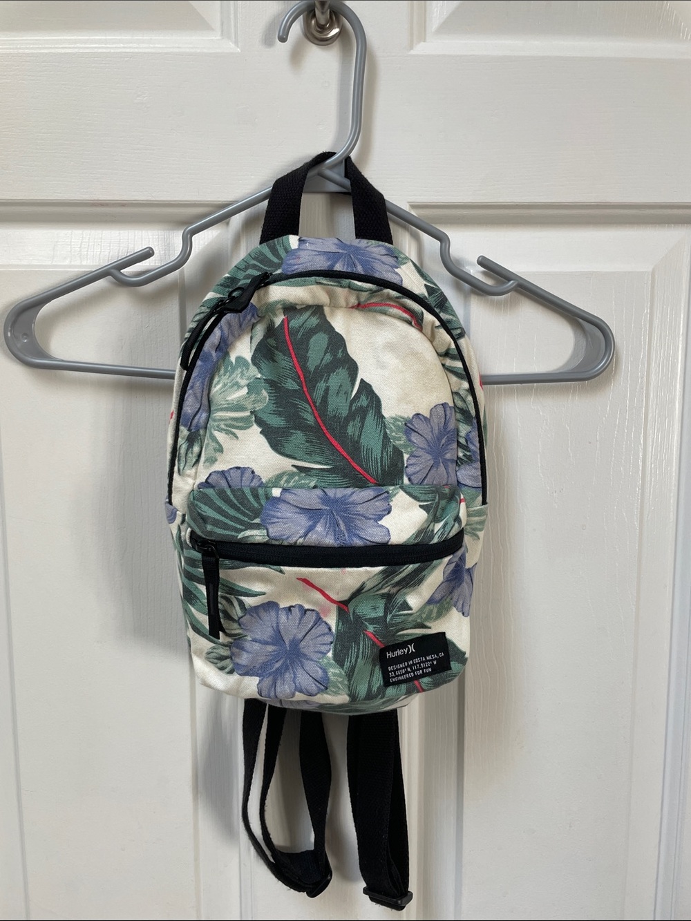Hurley Cream Floral Mini Backpack with Green Leaves and Purple Flowers